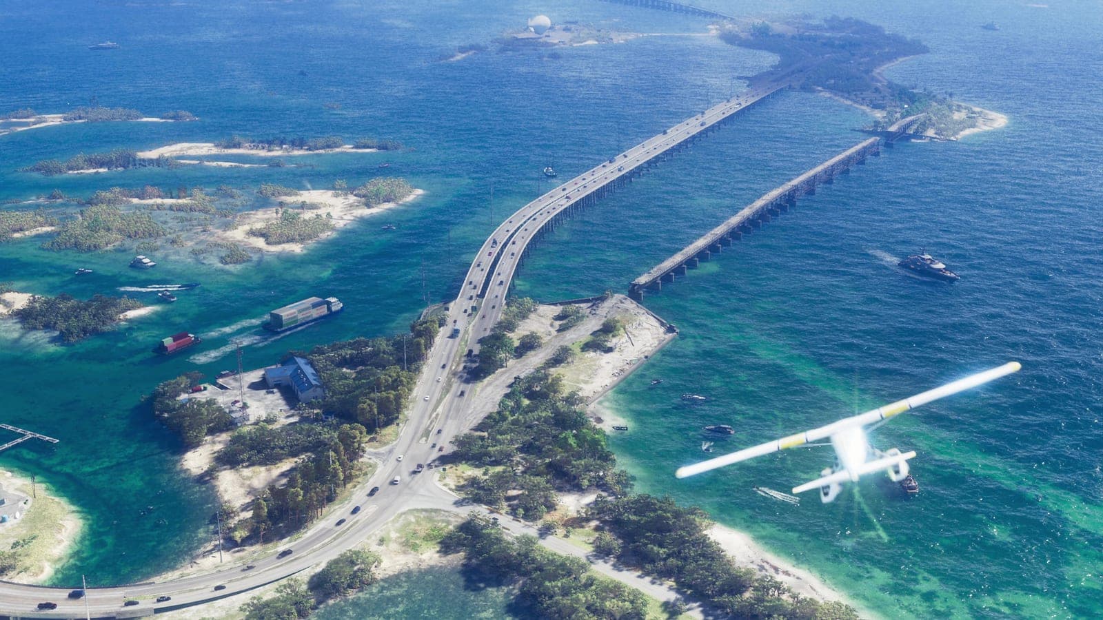 An aerial view of a highway bridge crossing open water towards the Vice City skyline, a small plane in the foreground.